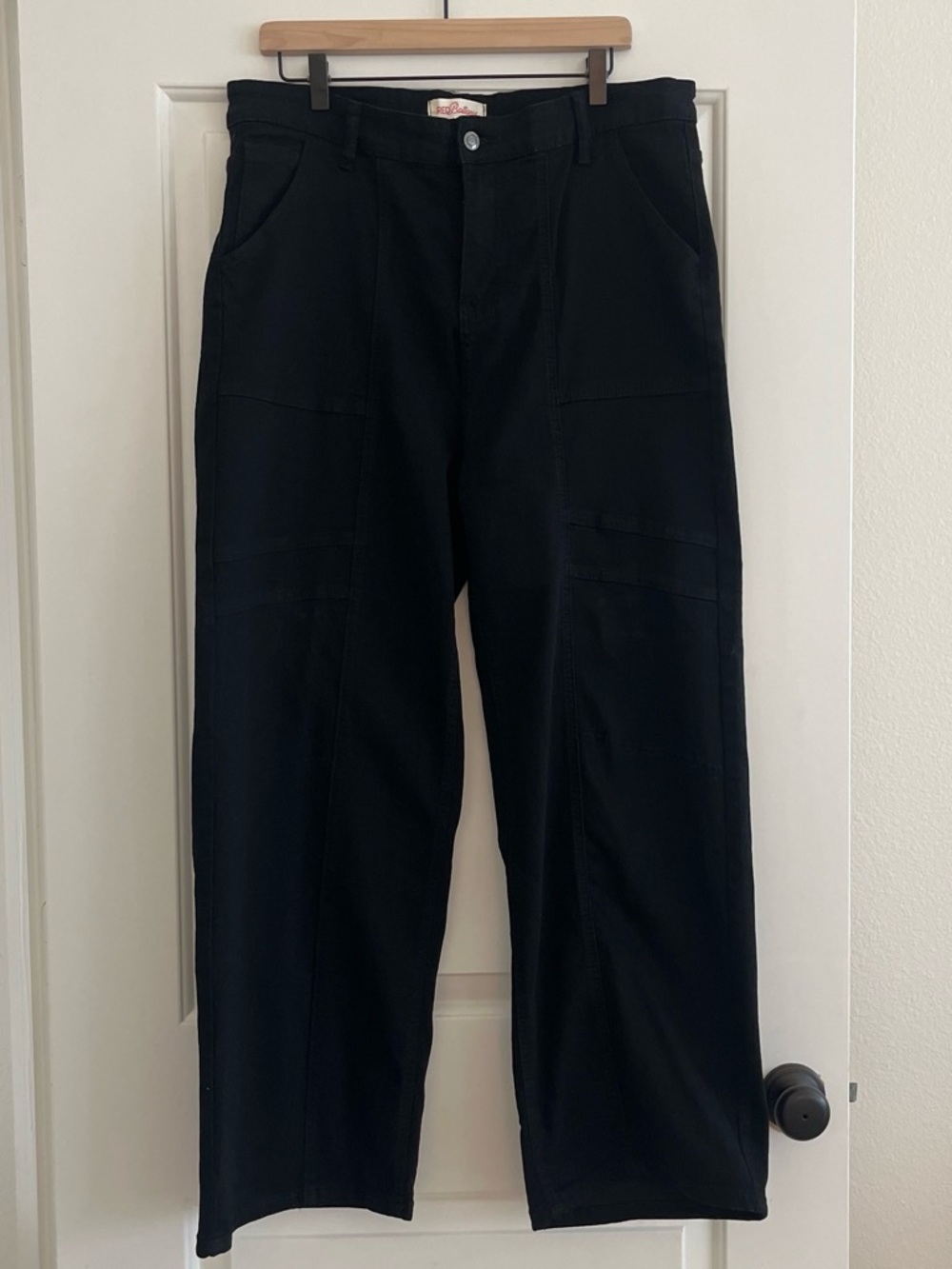 Red Bottoms black wide leg cargo pants with a relaxed fit
